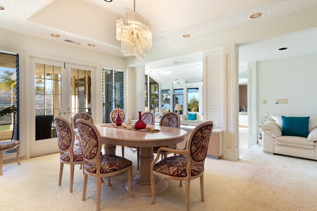 71-1638 Puu Napoo Dr, Kailua-Kona, HI 96740 - dining area featuring light carpet, french doors, recessed lighting, and a chandelier