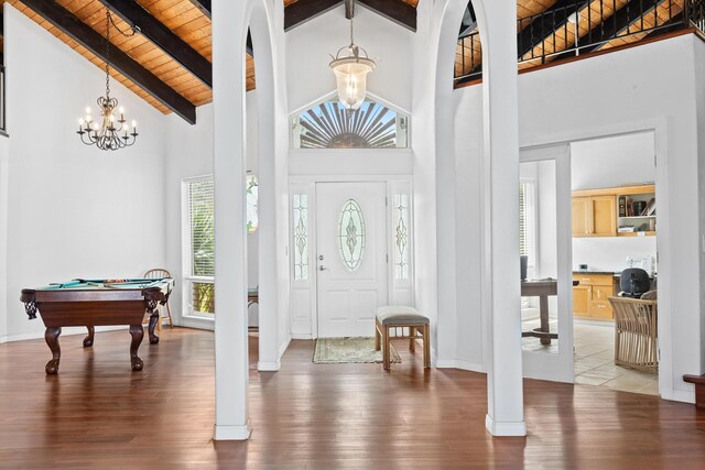 39-3298 Old Mamalahoa Hwy, Ookala, HI 96774 - entryway with a chandelier, wooden ceiling with exposed beams, high vaulted ceiling, wood finished floors, and billiards table