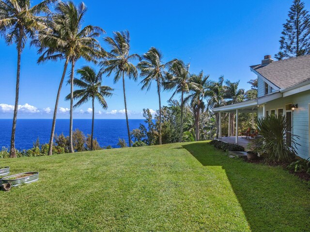 39-3298 Old Mamalahoa Hwy, Ookala, HI 96774 - view of grassy yard featuring a water view and a patio