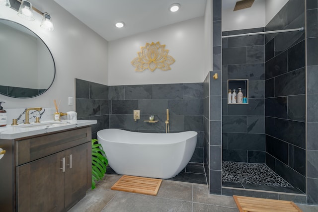 11-3366 Pa Alii St, Volcano, HI 96785 - full bathroom with vanity, a walk in shower, a soaking tub, and tile walls