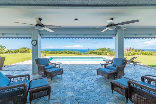 76-135 Kamehamalu St, Kailua-Kona, HI 96740 - view of patio / terrace with ceiling fan and an outdoor pool