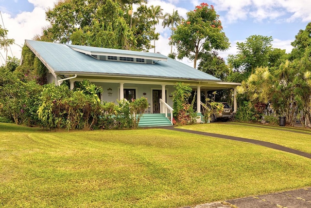 338 Kauila St, Hilo, HI 96720 - view of front of property featuring a porch, a front lawn, metal roof, and stucco siding