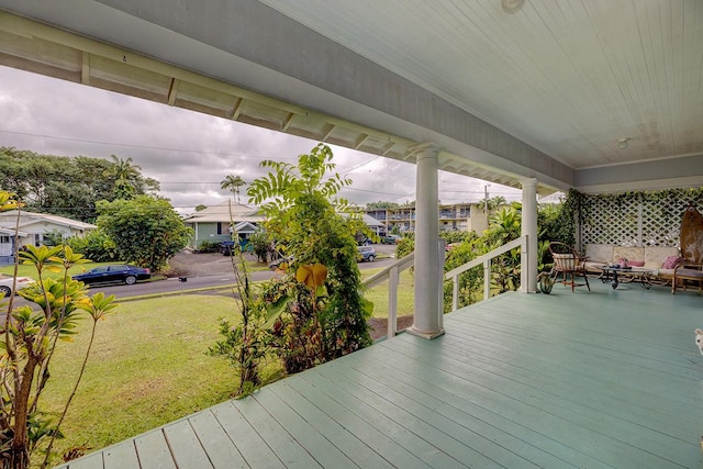 338 Kauila St, Hilo, HI 96720 - porch featuring a yard