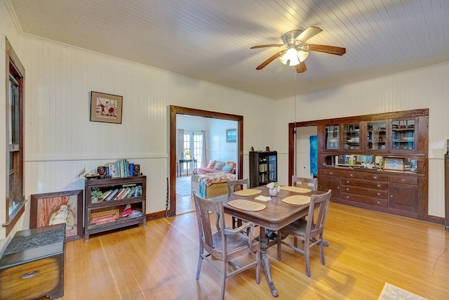 338 Kauila St, Hilo, HI 96720 - dining space with light wood finished floors, a ceiling fan, and crown molding