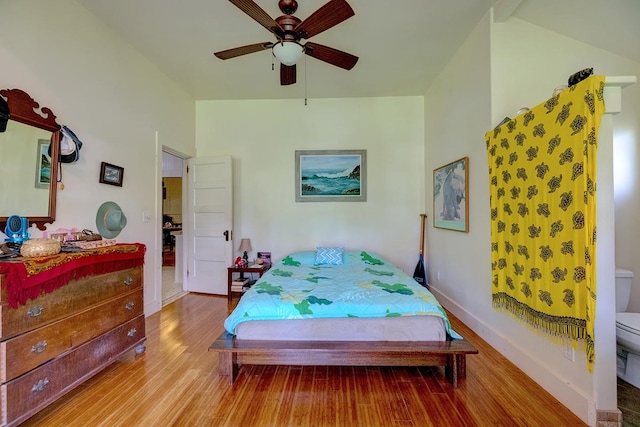 338 Kauila St, Hilo, HI 96720 - bedroom featuring wood finished floors, baseboards, and ceiling fan