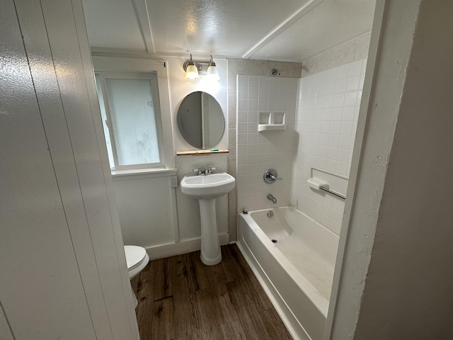 55-680 Hawi Rd, Hawi, HI 96719 - full bath with wood finished floors, toilet, bathing tub / shower combination, and a sink