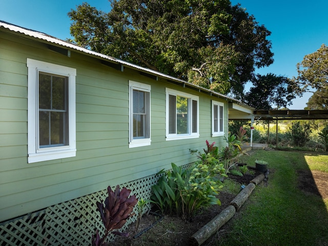 55-680 Hawi Rd, Hawi, HI 96719 - view of property exterior featuring a yard and metal roof