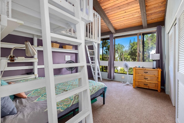 78-6800 Alii Dr Unit 6301, Kailua-Kona, HI 96740 - bedroom featuring multiple windows, carpet flooring, and wood ceiling with exposed beams