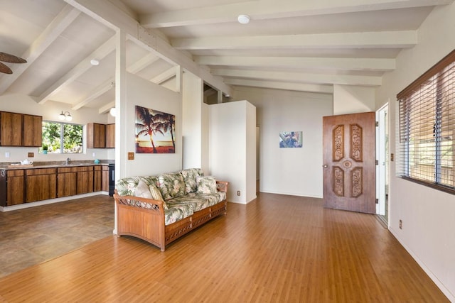 87-3219 Boki Rd, Captain Cook, HI 96704 - living area with wood finished floors, a ceiling fan, and baseboards