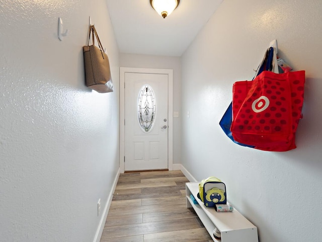 74-5114 Kumakani St, Kailua-Kona, HI 96740 - entryway featuring wood finished floors and baseboards