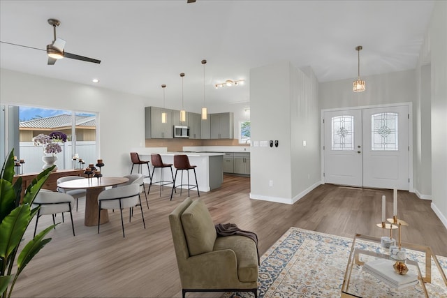 15-1517 Beach Rd, Keaau, HI 96749 - entrance foyer featuring light wood-style floors, baseboards, and a ceiling fan