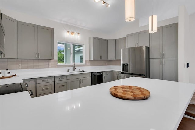15-1517 Beach Rd, Keaau, HI 96749 - kitchen featuring stainless steel fridge, gray cabinetry, a sink, and dishwasher