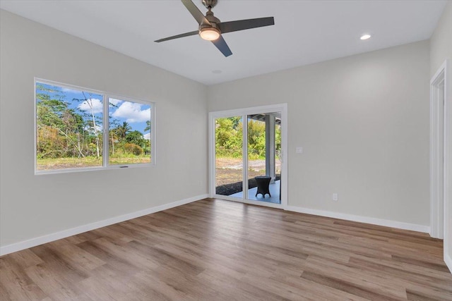 15-1517 Beach Rd, Keaau, HI 96749 - empty room with plenty of natural light, wood finished floors, a ceiling fan, baseboards, and recessed lighting