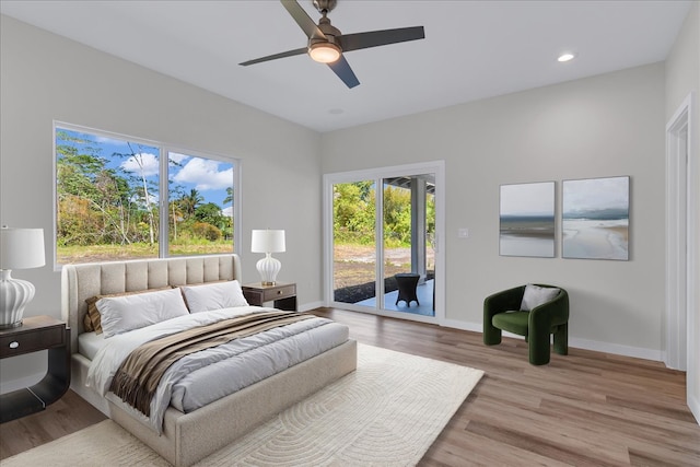 15-1517 Beach Rd, Keaau, HI 96749 - bedroom with access to exterior, baseboards, wood finished floors, ceiling fan, and recessed lighting