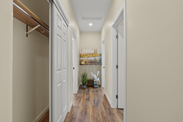 3905 Kila Pl, Hilo, HI 96720 - corridor featuring wood finished floors, baseboards, attic access, and recessed lighting