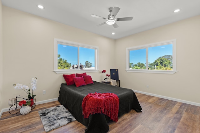 3905 Kila Pl, Hilo, HI 96720 - bedroom featuring multiple windows, baseboards, wood finished floors, recessed lighting, and ceiling fan