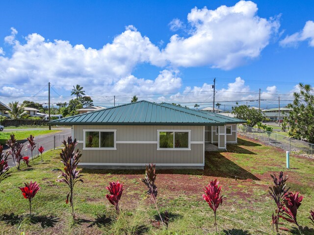 3905 Kila Pl, Hilo, HI 96720 - view of side of home featuring metal roof