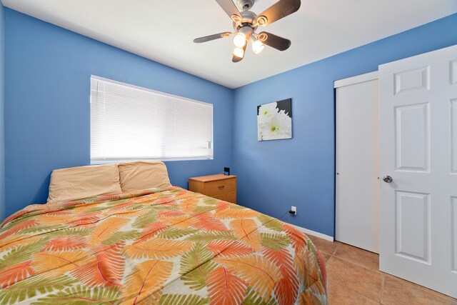 88-198 Aoao Ave, Captain Cook, HI 96704 - bedroom featuring light tile patterned floors, a closet, and a ceiling fan