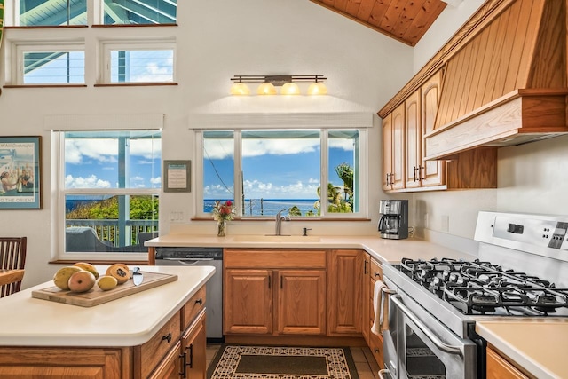 1650 Makanui Rd, Koloa, HI 96756 - kitchen featuring appliances with stainless steel finishes, custom exhaust hood, light countertops, high vaulted ceiling, and brown cabinets