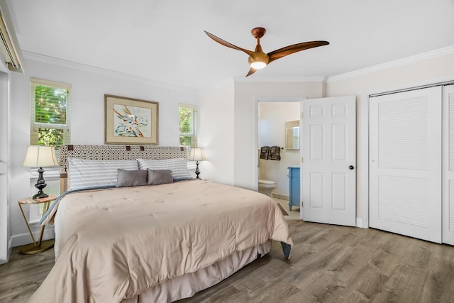 1650 Makanui Rd, Koloa, HI 96756 - bedroom featuring ornamental molding, multiple windows, wood finished floors, and a closet