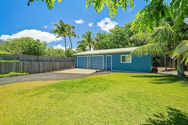 1650 Makanui Rd, Koloa, HI 96756 - view of yard featuring driveway and a garage