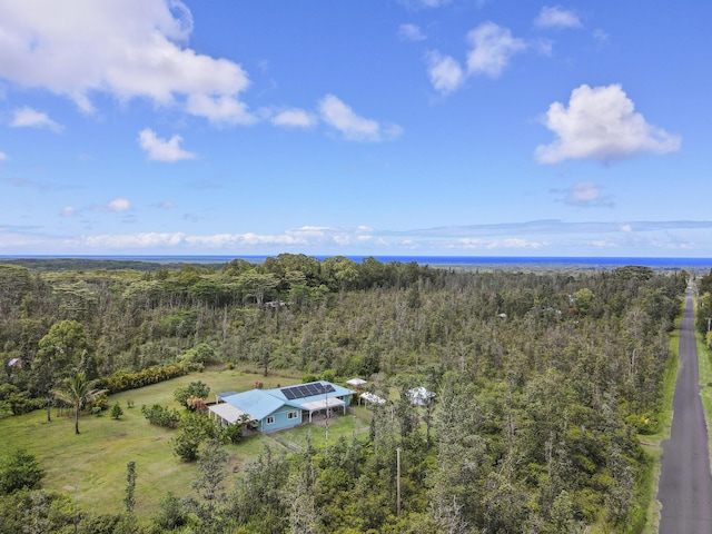 16-484 Laniuma St, Keaau, HI 96749 - aerial view of property and surrounding area featuring a heavily wooded area and a large body of water