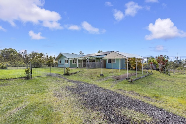 16-484 Laniuma St, Keaau, HI 96749 - view of front of property featuring a gate, driveway, metal roof, and a carport