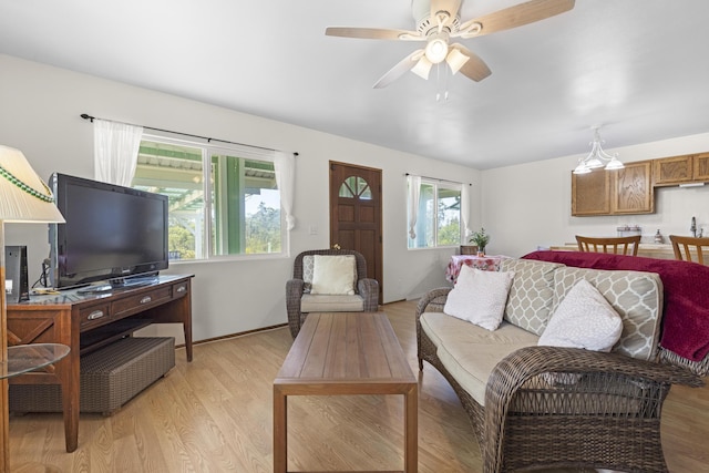 16-484 Laniuma St, Keaau, HI 96749 - living room with light wood finished floors and a ceiling fan