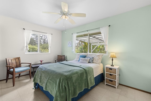 16-484 Laniuma St, Keaau, HI 96749 - bedroom featuring multiple windows, baseboards, and ceiling fan
