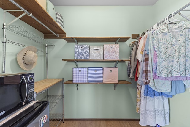 16-484 Laniuma St, Keaau, HI 96749 - walk in closet with wood finished floors