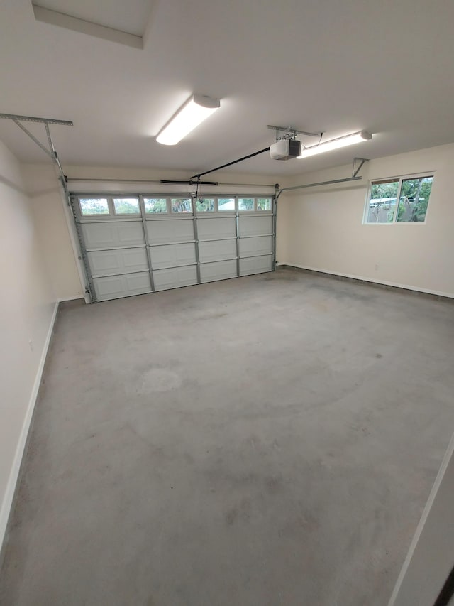 16-2051 Hale Way, Pahoa, HI 96778 - garage with baseboards and a garage door opener