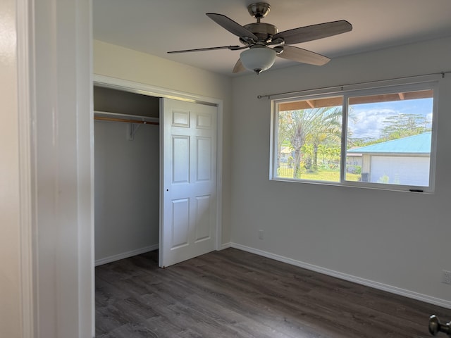 16-2051 Hale Way, Pahoa, HI 96778 - unfurnished bedroom featuring dark wood finished floors, a closet, and a ceiling fan