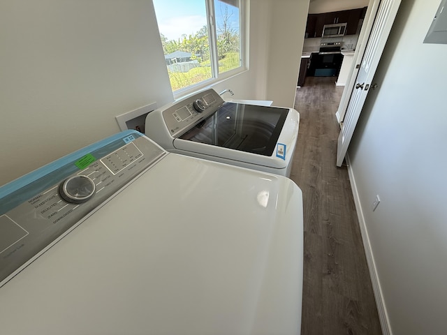 16-2051 Hale Way, Pahoa, HI 96778 - laundry area featuring separate washer and dryer and dark wood-style floors