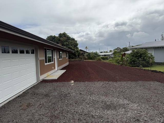 16-2051 Hale Way, Pahoa, HI 96778 - view of yard featuring a garage