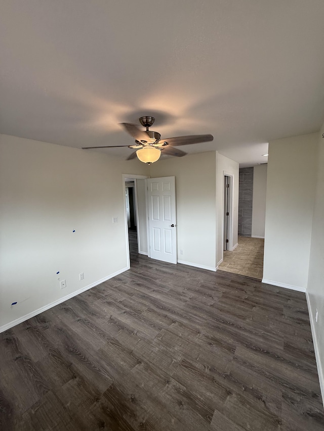 16-2051 Hale Way, Pahoa, HI 96778 - unfurnished room featuring dark wood-type flooring and a ceiling fan