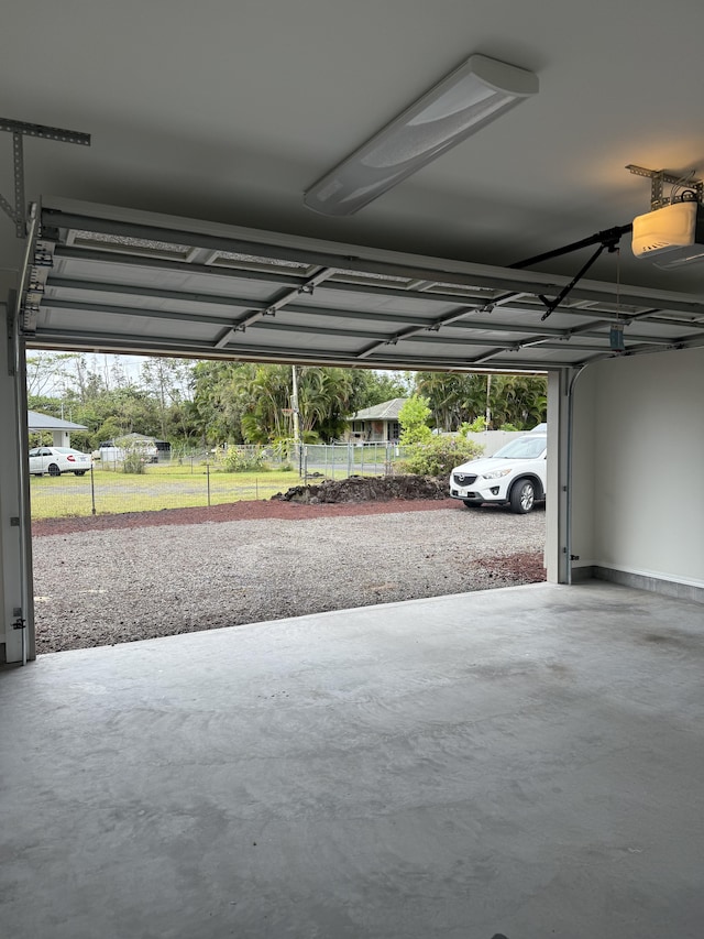 16-2051 Hale Way, Pahoa, HI 96778 - garage featuring a garage door opener