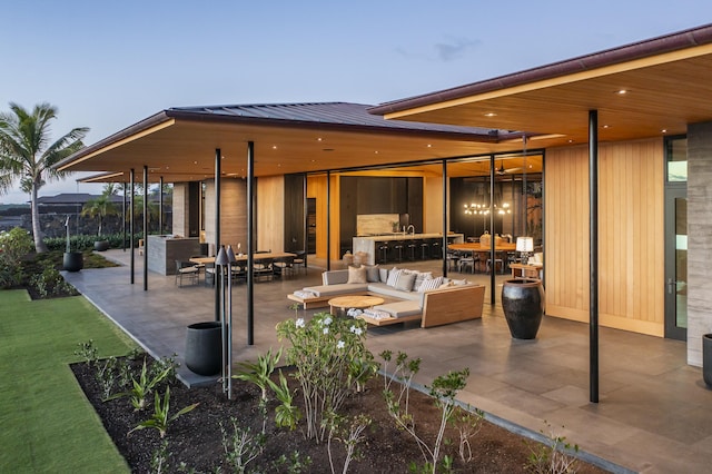 73-2210 Ala Kohanaiki, Kailua Kona, HI 96740 - view of patio featuring exterior kitchen, an outdoor living space, and outdoor dining space