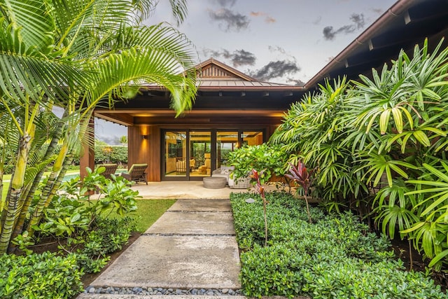 73-4461 Lemi Pl Unit 38, Kailua Kona, HI 96740 - entrance to property featuring metal roof, french doors, and a standing seam roof