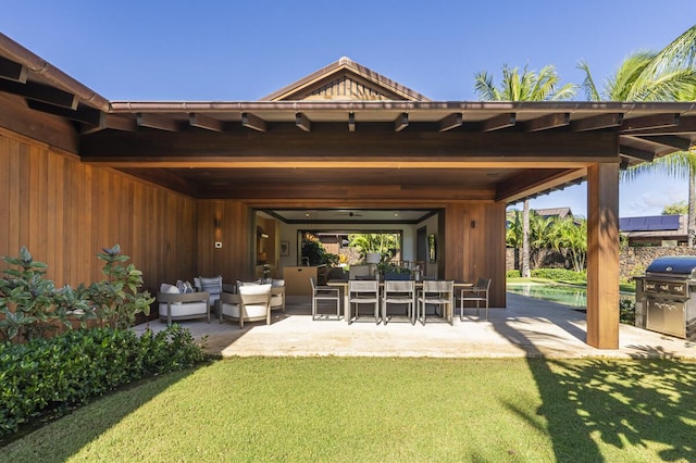 73-4461 Lemi Pl Unit 38, Kailua Kona, HI 96740 - view of patio with grilling area and an outdoor hangout area