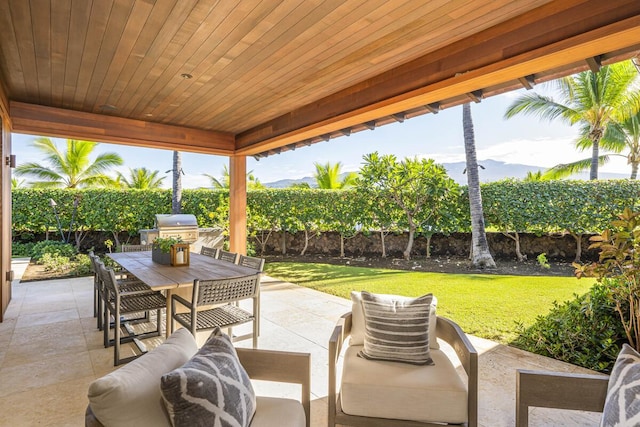 73-4461 Lemi Pl Unit 38, Kailua Kona, HI 96740 - view of patio with outdoor dining area and a grill
