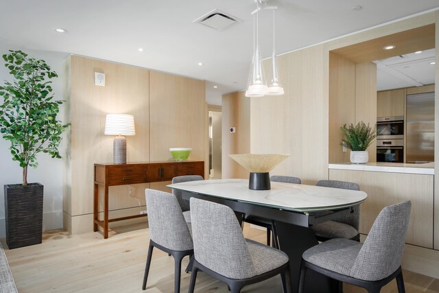 66-84 Kaunaoa Dr Unit C33, Kamuela, HI 96743 - dining space featuring light wood-type flooring and recessed lighting