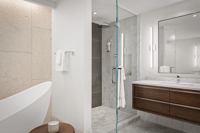 66-84 Kaunaoa Dr Unit C33, Kamuela, HI 96743 - bathroom featuring a walk in shower, vanity, a soaking tub, marble finish flooring, and recessed lighting
