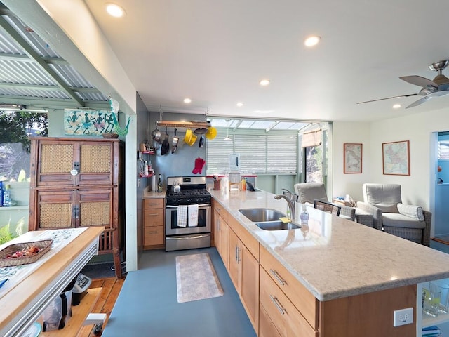 88-1541 Elima Ave, Captain Cook, HI 96704 - kitchen with gas stove, a sink, ceiling fan, recessed lighting, and open floor plan