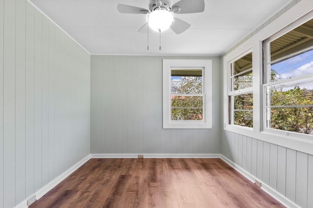 217 Haihai St, Hilo, HI 96720 - empty room with dark wood-style floors and a ceiling fan