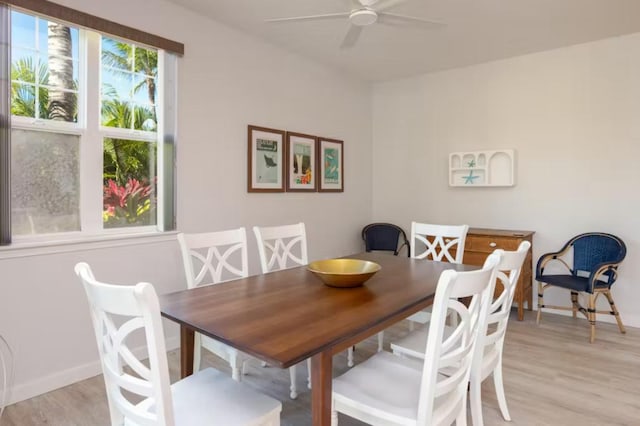 69-555 Waikoloa Beach Dr Unit 2105, Waikoloa, HI 96738 - dining area with ceiling fan, light wood-style floors, and baseboards