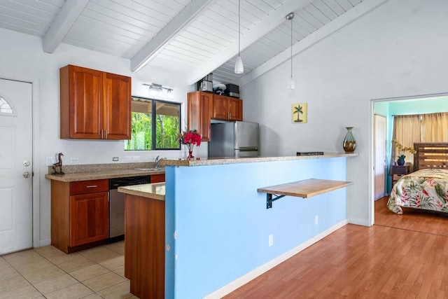 89-1444 Anapuka Rd, Captain Cook, HI 96704 - kitchen with stainless steel appliances, decorative light fixtures, brown cabinetry, high vaulted ceiling, and light wood-style flooring