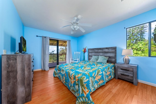 89-1444 Anapuka Rd, Captain Cook, HI 96704 - bedroom with access to outside, wood finished floors, baseboards, and a ceiling fan