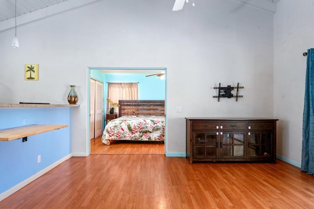 89-1444 Anapuka Rd, Captain Cook, HI 96704 - bedroom with wood finished floors, baseboards, vaulted ceiling, and a ceiling fan