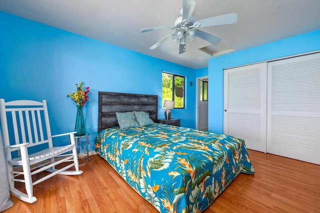 89-1444 Anapuka Rd, Captain Cook, HI 96704 - bedroom with wood finished floors, a closet, a ceiling fan, and baseboards