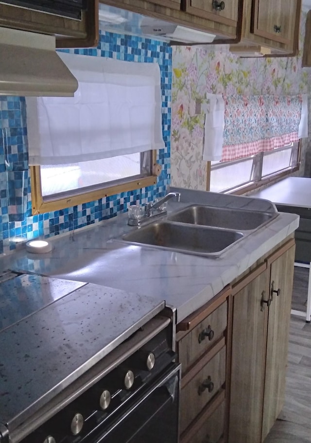 18-4209 Heno St, Mountain View, HI 96771 - kitchen featuring a sink, stove, light countertops, and backsplash